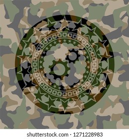 gear, team work icon inside camo texture