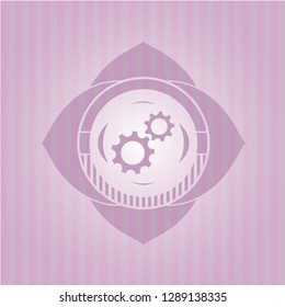 gear, team work icon inside pink emblem. Vintage.