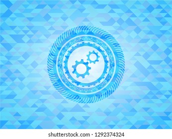 gear, team work icon inside realistic sky blue mosaic emblem