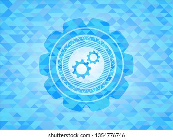 gear, team work icon inside realistic sky blue mosaic emblem