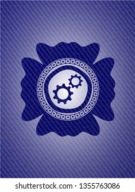 gear, team work icon inside jean or denim emblem or badge background