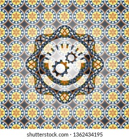 gear, team work icon inside arabic emblem. Arabesque decoration.