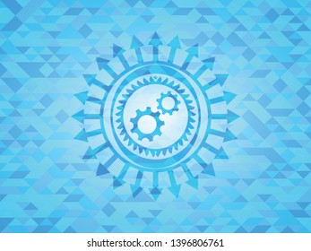 gear, team work icon inside sky blue mosaic emblem