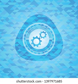 gear, team work icon inside realistic sky blue mosaic emblem