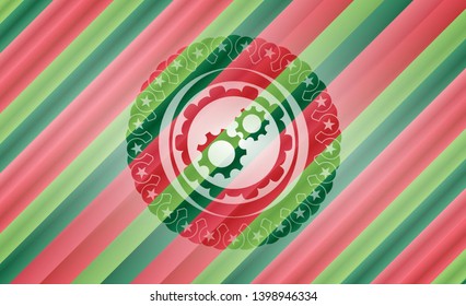 gear, team work icon inside christmas colors style badge.