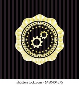 gear, team work icon inside golden badge or emblem