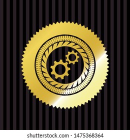 gear, team work icon inside gold shiny badge