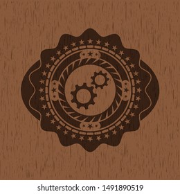 gear, team work icon inside wood emblem
