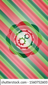 gear, team work icon inside christmas colors style badge.
