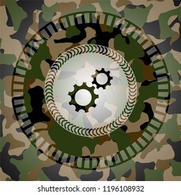 gear, team work icon on camo pattern
