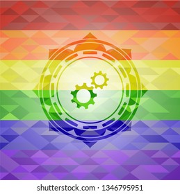 gear, team work icon on mosaic background with the colors of the LGBT flag