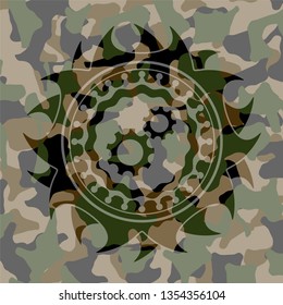 gear, team work icon on camouflage pattern