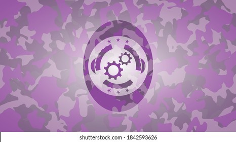 gear, team work icon on pink and purple camo pattern. 