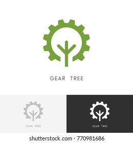 Gear wheel and tree logo - green plant and pinion symbol. Ecology, nature and industry vector icon.