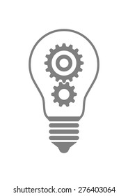 Gears in lightbulb on white background 