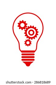 Gears in lightbulb on white background 