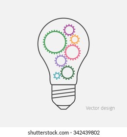 Gears in lightbulb on white background
