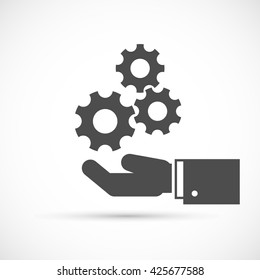 Gears on hand icon
