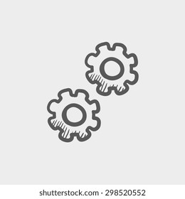 Icono de esbozo de engranajes para web y móvil. Icono de gris oscuro vector dibujado a mano sobre fondo gris claro.