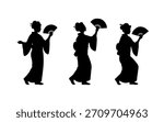 Geisha silhouette set in kimono walking and holding a traditional japanese fan