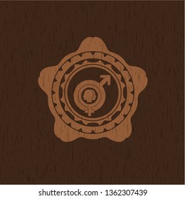 gender dysphoria icon inside badge with wood background