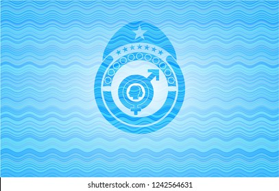 gender dysphoria icon inside light blue water wave style emblem.