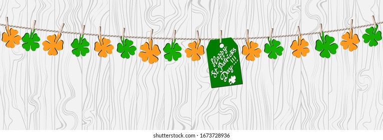 General Banner für den Urlaub St. Patrick's Day Stockillustration. Site-Header mit grünen und gelben Kleeblatten und ein Stick von "Luck" auf den Bekleidung Auf hellhölzernem Tischhintergrund. 