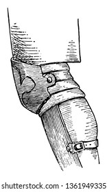 Genouillre being held in place by a strap passing round the leg, vintage line drawing or engraving illustration.
