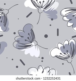 Gentle airy flowers in gray, white and light gray colors seamless pattern on gray background.
