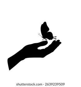 Gentle hand holding a delicate butterfly silhouette.