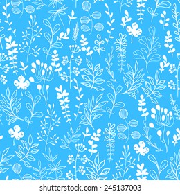 Gentle seamless blue background of branches and leaves. Vector pattern. 