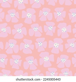 Gentle seamless pattern with pink floral motif. Trendy simple hand drawn floral texture in vector. Great for textile paper fabric gift wrap and more.