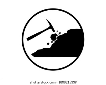 Geological pick hammer hitting rock from outcrop