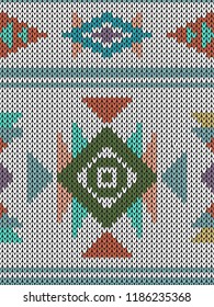Geometric abstract knitted pattern. Abstract ethnic seamless pattern. Design for sweater, scarf, comforter or clothes texture. Vector illustration.