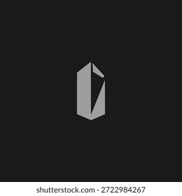 Logotipo de monólito abstrato geométrico simbolizando a força e forma atemporal.