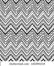 Geometric abstract pattern. Ethnic ornament . Black and white background. Seamless wallpaper. Doodle. Retro style