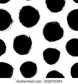 Geometric abstract seamless pattern with black circles. Modern black and white vector texture. Polka dot motif wallpaper. Geometric grunge background. Hand drawn circles shapes, round brush strokes.