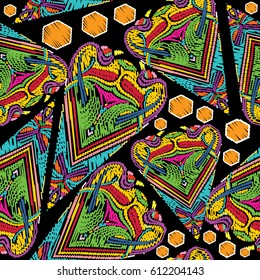 Geometric abstract seamless pattern. Black vector background with colorful geometrical figures, lines, shapes, hexagons, triangles in embroidery style. 