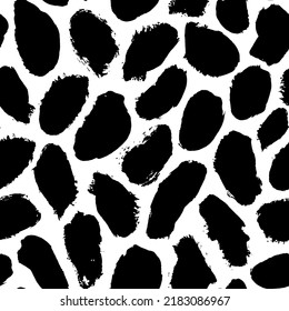 Geometric abstract seamless pattern with blots. Hand drawn black dots texture. Bold stains and irregular dots of different size texture. Modern seamless black and white ink stains pattern. 