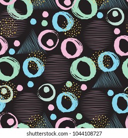 Geometric abstract seamless pattern with circles triangles and gold glitter elements-vector illustration.