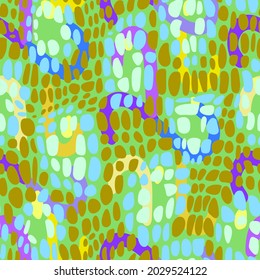 Geometric background made of different oval shapes. Tile pattern. Flat rounded elements. Seamless design with paving cell texture. Stylized artistic crocodile skin texture.