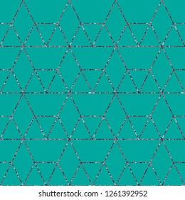 Geometric background with rhombus. Abstract geometric pattern. Glitter texture.Vector seamless geometric pattern.