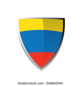 A geometric badge with the colombian flag on a white background