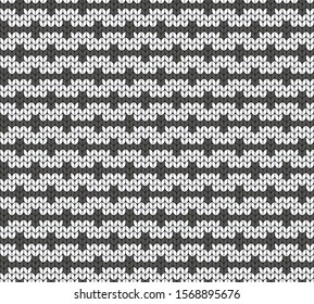 Geometric black and white pattern. Imitation knitting or embroidery. Seamless background. Jacquard.