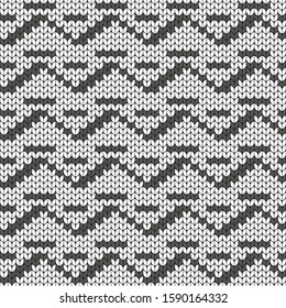 Geometric black and white pattern. Imitation knitting, embroidery. Seamless background. Jacquard.