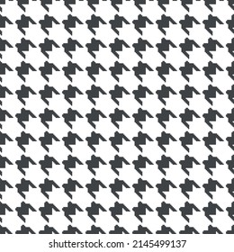 Geometric black and white seamless pattern with pied-de-poule ornament. Monochrome graphic repeating design. Modern minimalist stylish squared background. Vector chequered motif for fabric, textile.