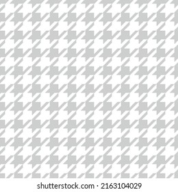 Geometric black and white seamless pattern with pied-de-poule ornament. Monochrome graphic repeating design. Modern minimalist stylish squared background. Vector chequered motif for fabric, textile.