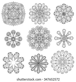 Geometric circular ornament set. Abstract black symbols. Lace mandalas. Vector illustration