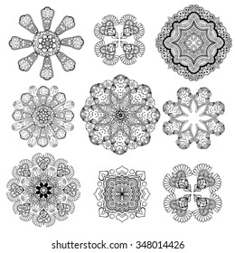 Geometric circular ornament set. Abstract black symbols. Lace mandalas. Vector illustration