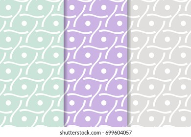 Geometric colored collection of seamless patterns for wallpapers and textile. Blue, violet and gray prints. Vector illustration